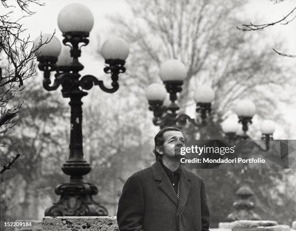 Portrait of Italian-born French actor and singer Serge Reggiani on Bastions of Porta Venezia. Milan, 1970s