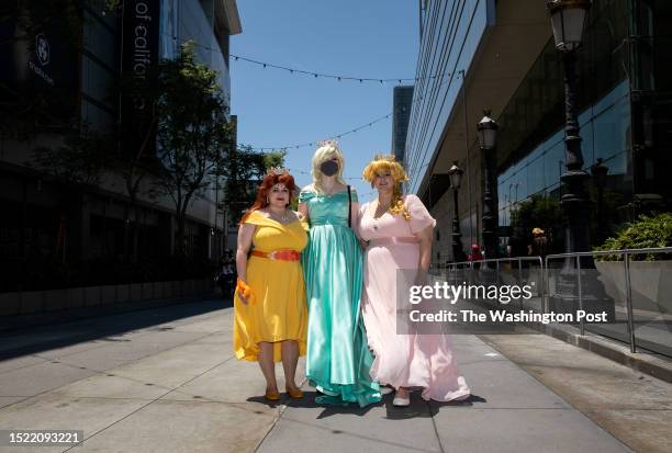 Super Mario Bros. Characters, Molly Bennett, dressed as Daisy, from left, Risa Wiltsie, dressed as Rosalina, and Nicole Williams, dressed as Peach,...