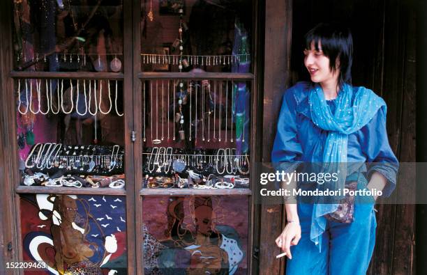 Typical Yugoslav crafts are exposed at Bascarsija, Sarajevo's old bazaar; it's owner has a break on the doorstep. Sarajevo , July 29, 1981.