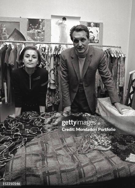 Fashion designer Ottavio Missoni and his wife Rosita in their atelier, surrounded by styles and materials. Italy, 1968.