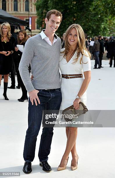 Andrew Murray and Kim Sears arrive at the Burberry Spring Summer 2013 Womenswear Show at Kensington Gardens on September 17, 2012 in London, England.