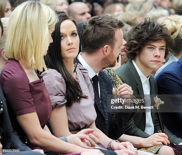 Alice Eve, Victoria Pendleton, Aaron Paul and Harry Styles attend the Burberry Spring Summer 2013 Womenswear Show Front Row at Kensington Gardens on...