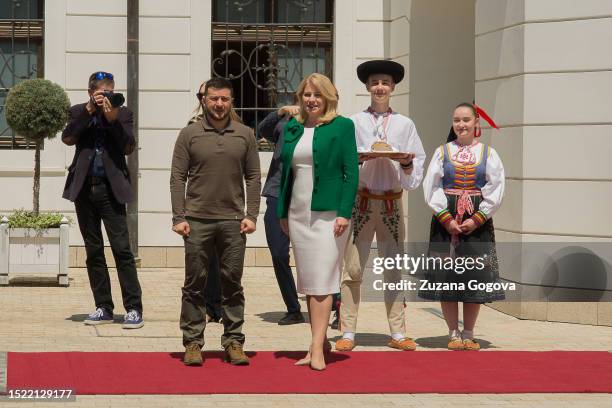 Ukrainian president Volodymyr Zelensky and Slovak president Zuzana Caputova pose for the press amid the arrival of Ukrainian president on July 7,...