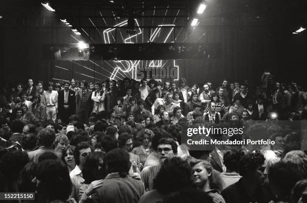 Massive crowd on the dance floor of Studio 54 disco. Milan, 1979.