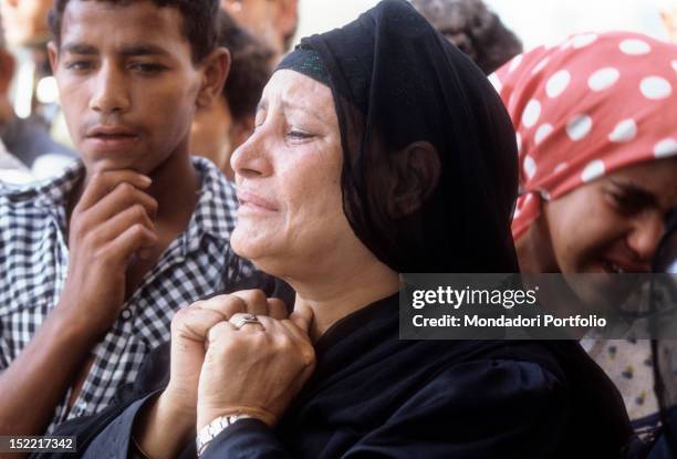 Woman is crying and pray during President Sadat Funerals, assassinated on October 6 during a parade by the terrorist Khalid al-Islambuli. Medinet...