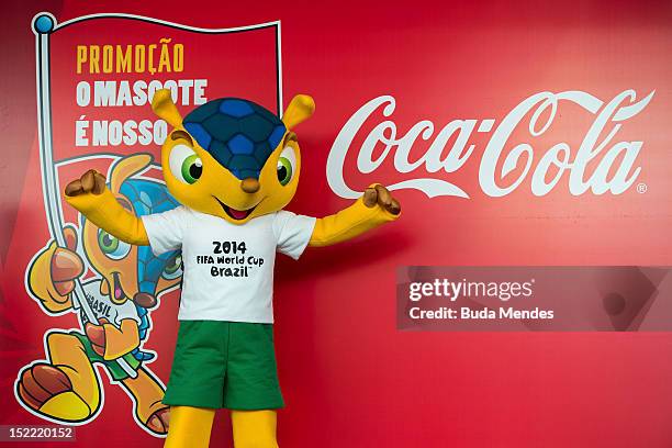 The official mascot of the FIFA World Cup Brazil 2014 poses for pictures during its official presentation at the Olympic Village Arthur da Tavola at...