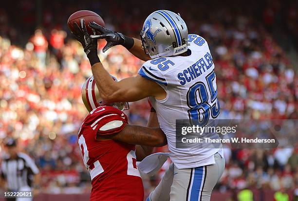 Carlos Rogers of the San Francisco 49ers breaks up a pass to Tony Scheffler of the Detroit Lions in the first quarter of an NFL football game at...