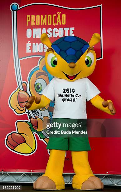 The official mascot of the FIFA World Cup Brazil 2014 poses for pictures during its official presentation at the Olympic Village Arthur da Tavola at...