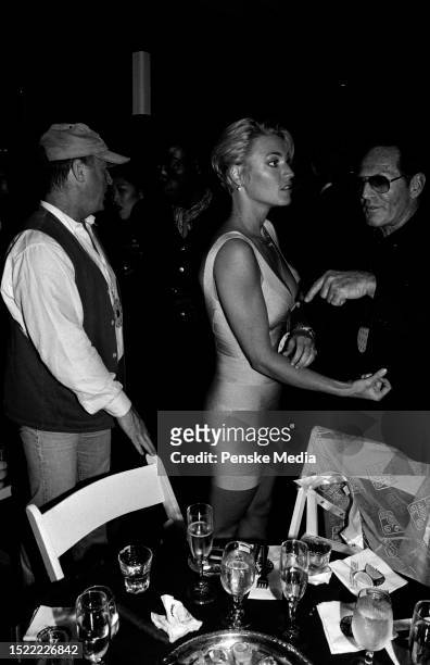 Tony Scott, Donna W. Scott, and guest attend the afterparty for the local premiere of "The Fan" at the All Star Cafe in New York City on August 12,...