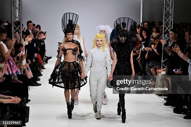 Designer Pam Hogg walks on the catwalk by Pam Hogg on day 4 of London Fashion Week Spring/Summer 2013, at the Freemasons' Hall on September 17, 2012...