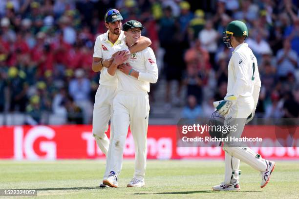 Todd Murphy of Australia celebrates with Mitchell Starc after dismissing England captain Ben Stokes during Day Two of the LV= Insurance Ashes 3rd...