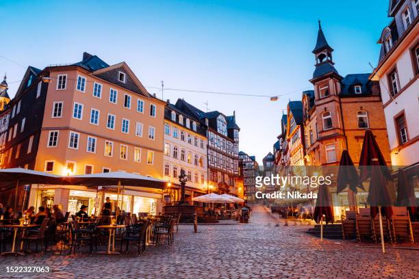 historic market place of marburg at blue hour - marburg germany stock pictures, royalty-free photos & images