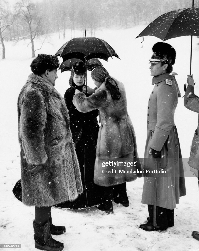 Romy Schneider, Helmut Berger and Luchino Visconti on 'Ludwig' film set