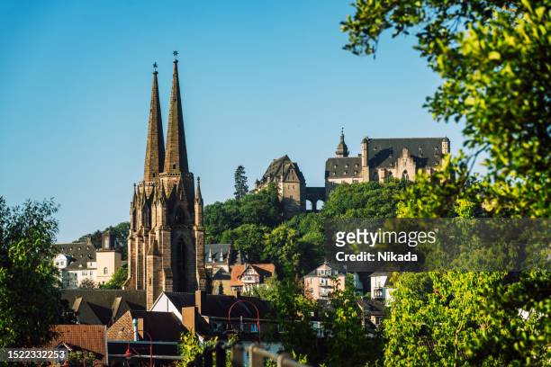 germany city of marburg with castle in the background - marburg germany stock pictures, royalty-free photos & images