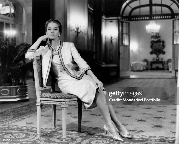 French actress and model Capucine posing in a hotel. Rome, 1962