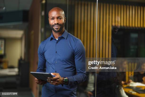 portrait successful african american male business manager and financial advisor - investor confidence stock pictures, royalty-free photos & images