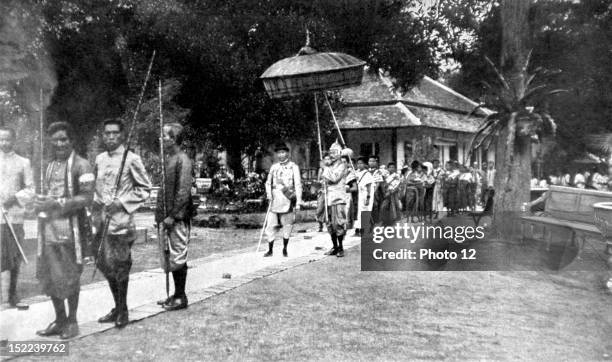 Cambodia Coronation of His Majesty Monivong, King of Cambodia, The king, preceded by his guards and followed by his wives.