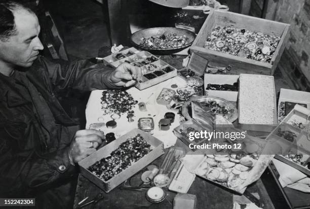 These jewels are a few of the thousands of valuables the German took from their victims in the Buchenwald concentration camp near Weimar , The loot,...