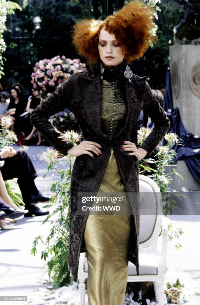 Fall 1997 A model walks the runway in the Christian Dior Fall 1997 Couture ...