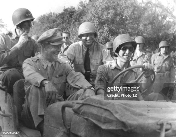 General Eisenhower, Commander in Chief of Allied Forces, tours the Salerno front in a jeep with Lt, Gen Mark W, Clark and Admiral H, K, Hewitt Italy...