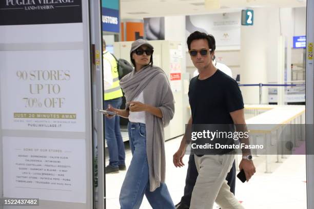 John Giordano and Pritika Swarup are seen arriving ahead of the annual Dolce & Gabbana Alta Moda events at Bari Airport on July 07, 2023 in Bari,...