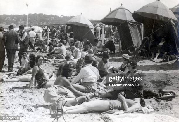 Beach at Deauville, August 15 Private Collection.