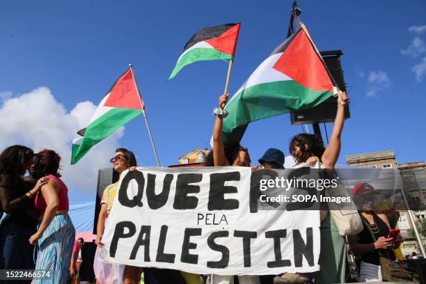 Poster supporting Queers in Palestine seen during the annual LGBTI+ Pride March. People participate in the annual LGBTI+ Pride March in Porto, this...