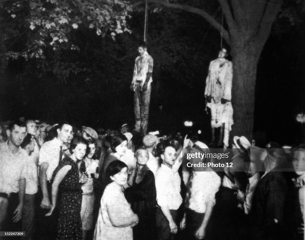 Lynching of two black men in Marion, Indiana, 1930, United States, New York, Schomburg Center.