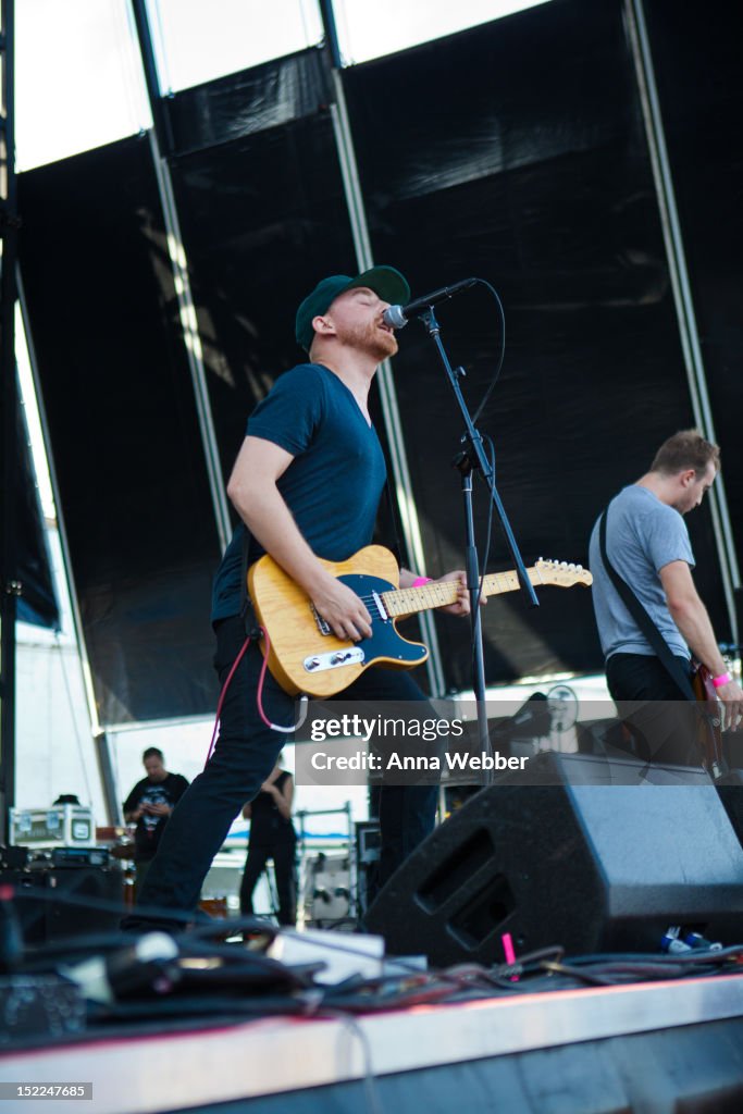 Singer Tom May of the Menzingers performs during the 2012 RIOT FEST ...