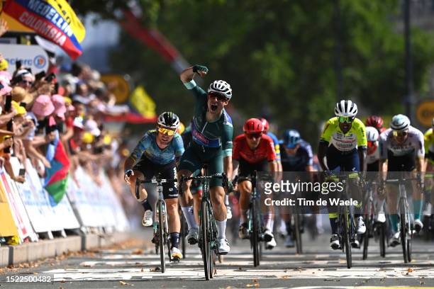 Jasper Philipsen of Belgium and Team Alpecin-Deceuninck - Green points jersey celebrates at finish line as stage winner ahead of Mark Cavendish of...