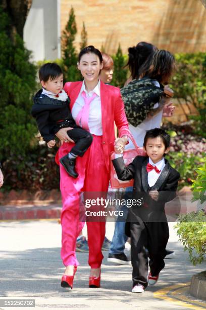 Actress Cecilia Cheung and her two sons attend the wedding ceremony of her younger brother Cheung Ho-lung on September 17, 2012 in Hong Kong.