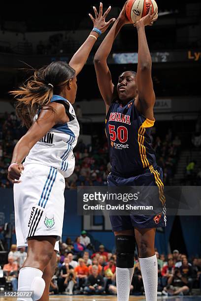 Jessica Davenport of the Indiana Fever shoots the ball against Taj McWilliams-Franklin of the Minnesota Lynx during the WNBA game on September 17,...