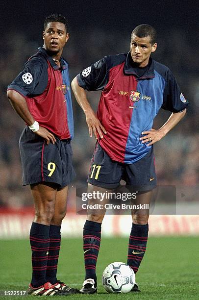 Patrick Kluivert and Rivaldo of Barcelona stand over a free-kick during the UEFA Champions League match against Hertha Berlin at the Nou Camp in...
