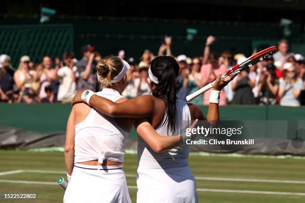 Heather Watson of Great Britain and Harriet Dart of Great Britain celebrate winning match point against Lyudmyla Kichenok of Ukraine and Jelena...