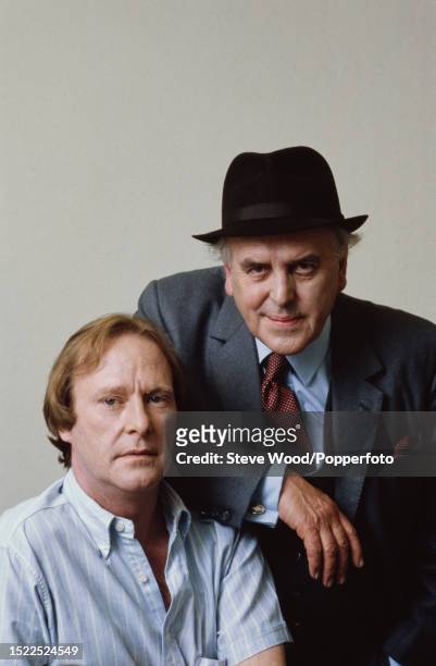 English actors Dennis Waterman and George Cole in character as Terry McCann and Arthur Daley respectively on the set of television series "Minder",...