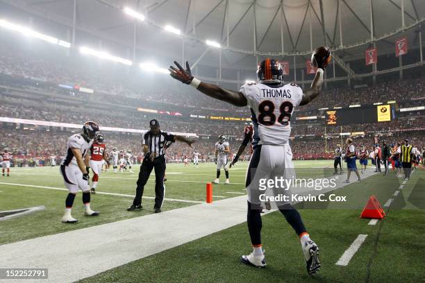 Wide receiver Demaryius Thomas of the Denver Broncos celebrates after scoring a touchdown in the second quarter against the Atlanta Falcons during a...