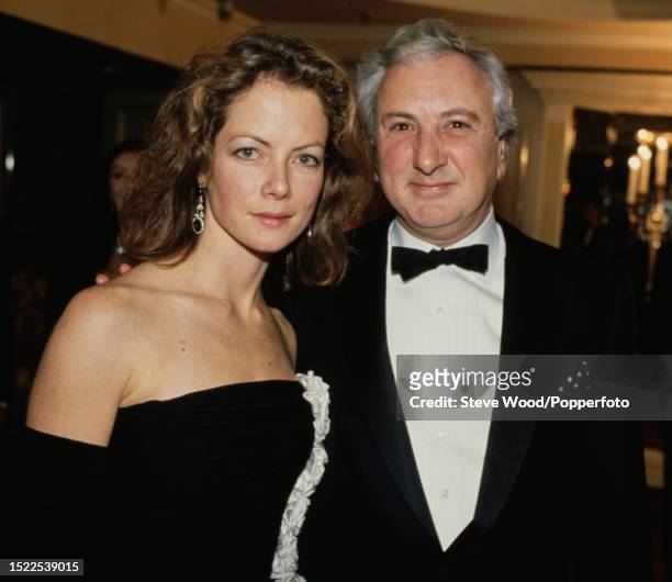 British filmmaker Michael Winner and his partner, actress Jenny Seagrove attending an event in London, England circa 1990.