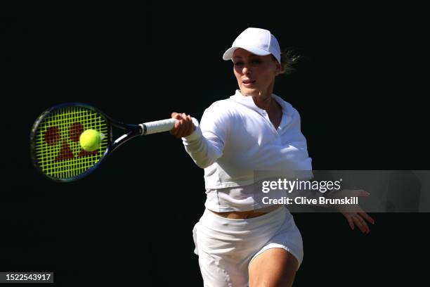 Ana Bogdan of Romania plays a forehand against Lesia Tsurenko of Ukraine in the Women's Singles third round match during day five of The...