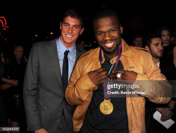 Olympic swimmer Conor Dwyer and rapper 50 Cent arrive at the premiere of Open Road Films' "End of Watch" at Regal Cinemas L.A. Live on September 17,...