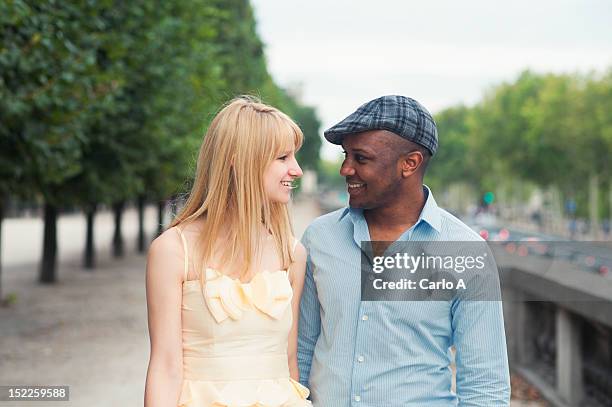 young couple in paris - close up of beautiful young blonde woman with black hat stock pictures, royalty-free photos & images