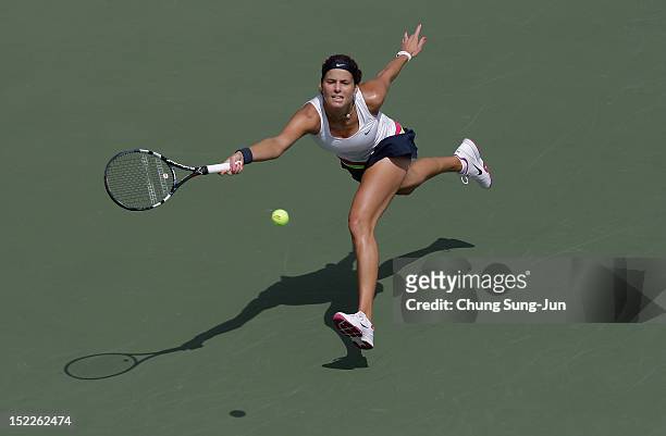 Julia Goerges of Germany plays a shot against Silvia Soler-Espinosa of Spain during day one of the KDB Korea Open at Olympic Park Tennis Stadium on...
