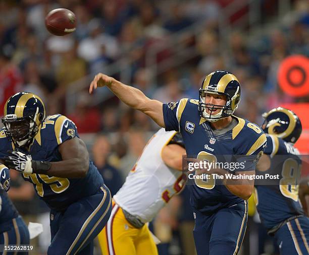 St. Louis Rams quarterback Sam Bradford passes in the first quarter during the St. Louis Rams defeat of the Washington Redskins 31 - 28 in the Edward...