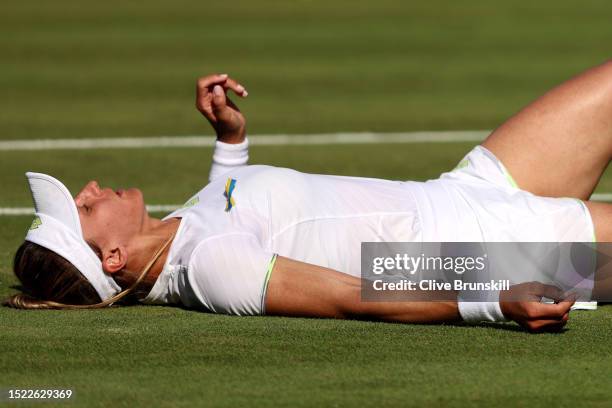 Lesia Tsurenko of Ukraine celebrates winning match point against Ana Bogdan of Romania in the Women's Singles third round match during day five of...