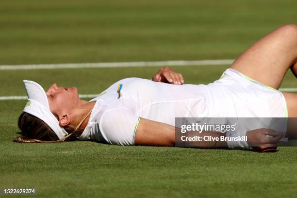 Lesia Tsurenko of Ukraine celebrates winning match point against Ana Bogdan of Romania in the Women's Singles third round match during day five of...