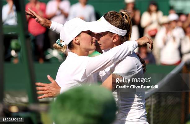 Lesia Tsurenko of Ukraine embraces Ana Bogdan of Romania following the Women's Singles third round match during day five of The Championships...