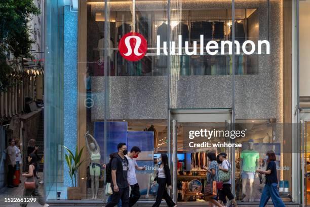 lululemon store in hong kong - lululemon stock pictures, royalty-free photos & images