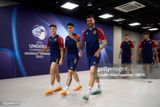 Rodrigo Riquelme, Sergio Camello and Mario Gila of Spain walks in prior to the Spain training session ahead of the UEFA Under-21 Euro 2023 Final...