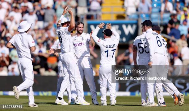 Chris Woakes of England celebrates with teammates after dismissing Usman Khawaja of Australia during Day Two of the LV= Insurance Ashes 3rd Test...