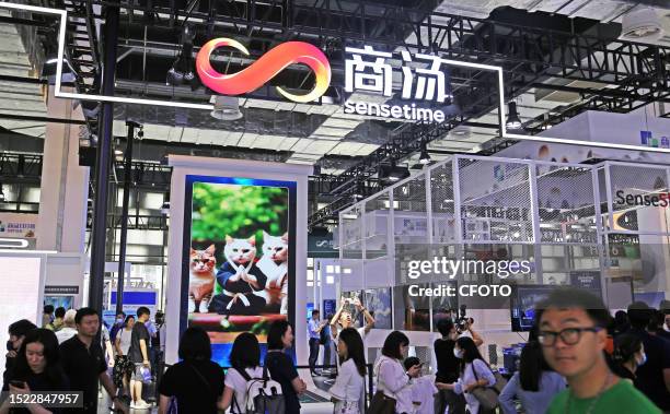 Visitors visit the Sensetime exhibition area at the 2023 World Artificial Intelligence Conference in Shanghai, China, July 7, 2023.