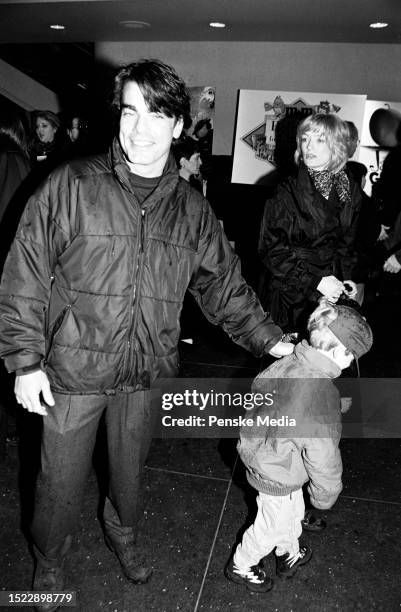 Peter Gallagher, James Gallagher , and Paula Harwood attend the local premiere of "James and the Giant Peach" at the Sony Lincoln Square Theater in...